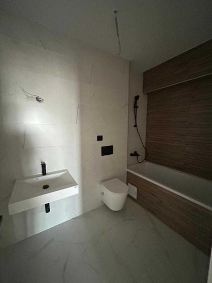 Apartament cu 3 camere decomandat în Cățelu