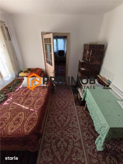 Casă cu 5 camere semidecomandat cu Teren 720 Mp în Gura Dimienii