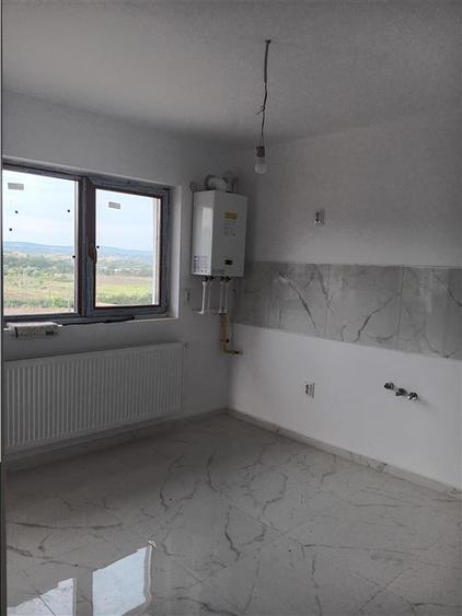 Casă individuală cu 4 camere cu Teren 450 Mp în Bârnova