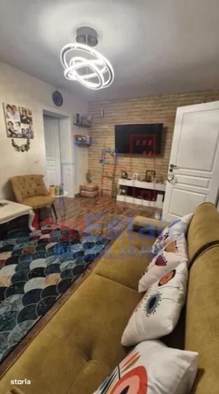 Apartament cu 3 camere semidecomandat în Alexandru cel Bun