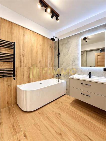 Apartament cu 2 camere semidecomandat, mobilat în Est
