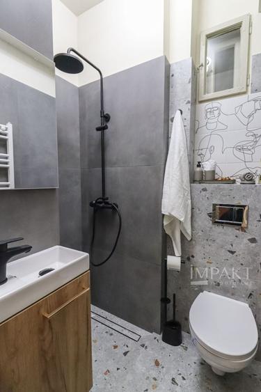 Apartament cu 2 camere semidecomandat, mobilat în Central