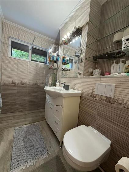 Apartament cu 2 camere semidecomandat în Podu Roș