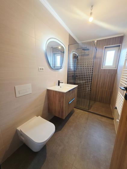 Casă individuală cu 4 camere cu Teren 500 Mp în Est