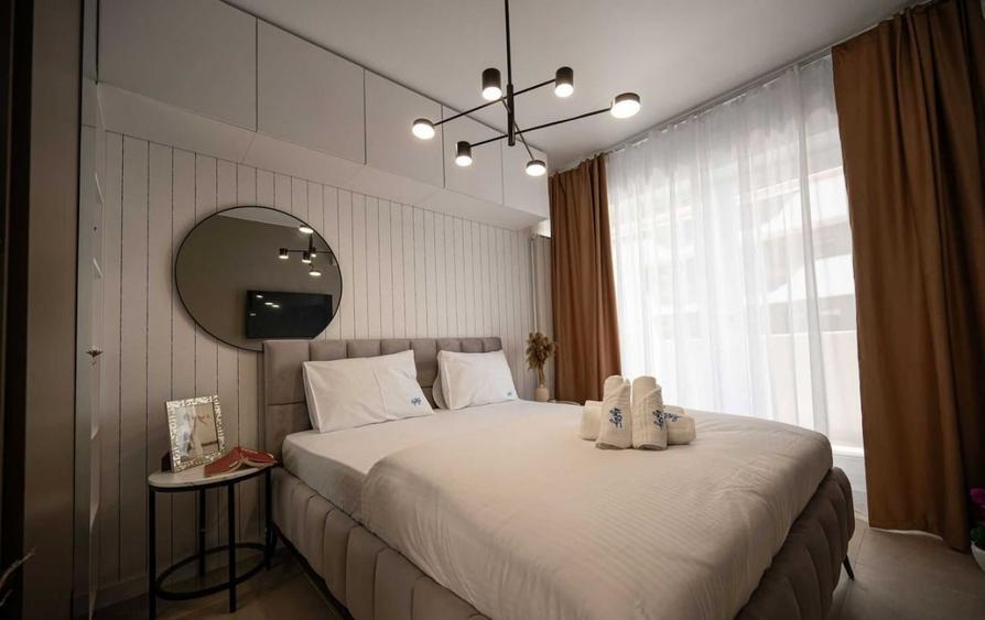 Apartament cu 2 camere semidecomandat, mobilat în Central