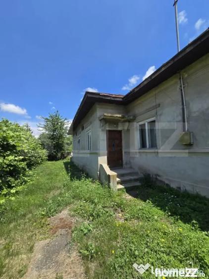 Casă cu 3 camere cu Teren 1500 Mp în Central