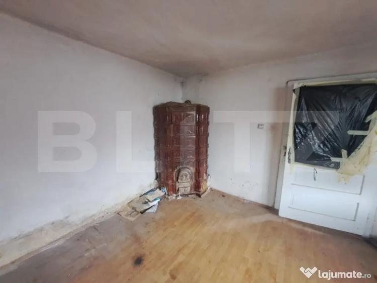 Casă cu 2 camere cu Teren 1400 Mp în Central