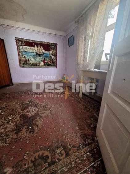 Casă individuală cu 2 camere cu Canalizare în Comănești