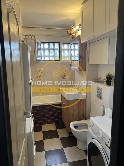 Apartament cu 3 camere semidecomandat, mobilat în Podu Roș