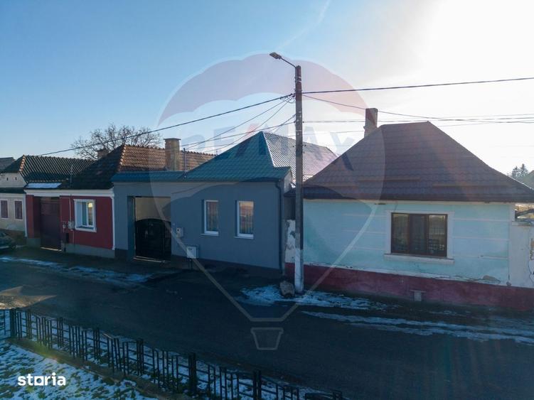 Casă cu 4 camere cu Teren 390 Mp în Hălchiu
