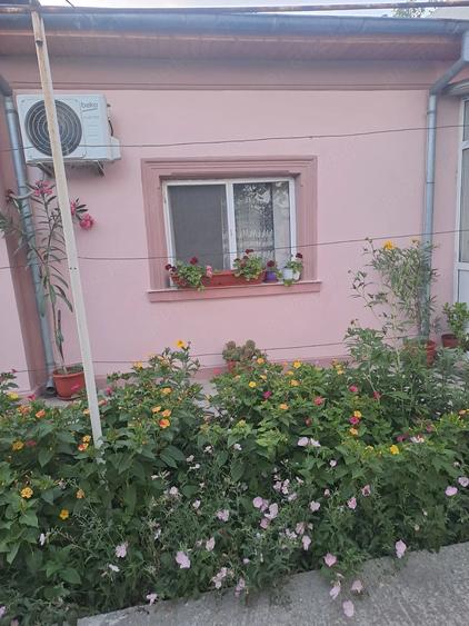 Casă cu Teren 1000 Mp în Central
