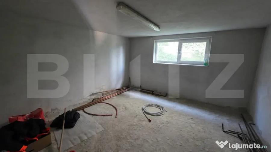 Casă cu 4 camere cu Teren 1000 Mp în Central