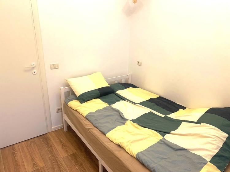 Apartament cu 2 camere semidecomandat, mobilat în Petricani