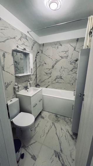 Apartament cu 2 camere semidecomandat, mobilat în Central