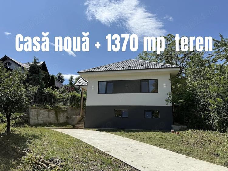 Casă cu Teren 1370 Mp în Teișani