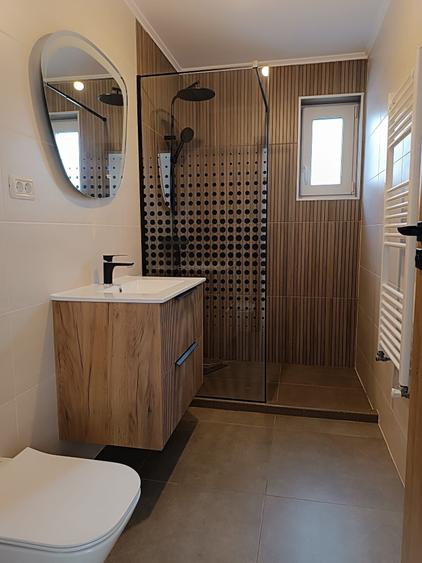 Casă cu 4 camere în Tărlungeni