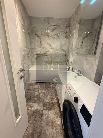 Apartament cu 2 camere semidecomandat în Chinteni