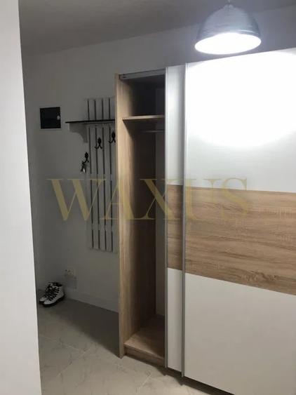 Apartament cu 2 camere semidecomandat, mobilat în Calea Moldovei