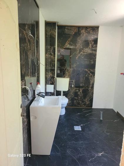 Casă cu Teren 1000 Mp în Central