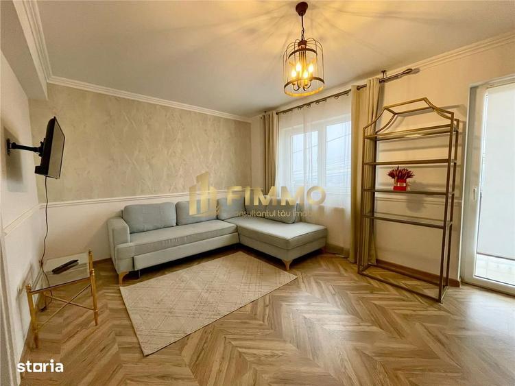 Apartament cu 2 camere semidecomandat, mobilat în Central