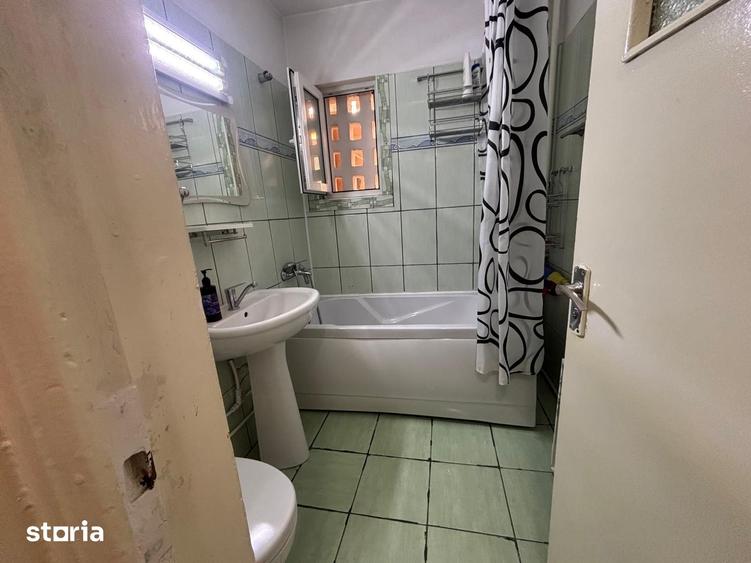 Apartament cu 2 camere semidecomandat în Podu Roș