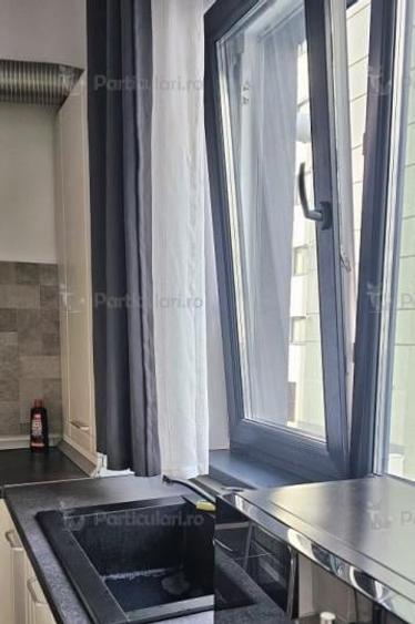 Apartament cu 2 camere semidecomandat, mobilat în Regie