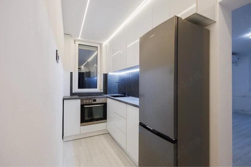 Apartament cu 3 camere semidecomandat în Central