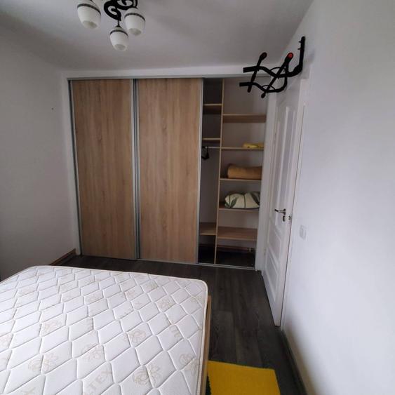 Apartament cu 2 camere semidecomandat, mobilat în Podu Roș