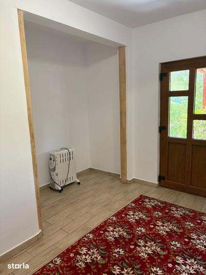 Casă cu 2 camere cu Teren 1100 Mp în Oituz
