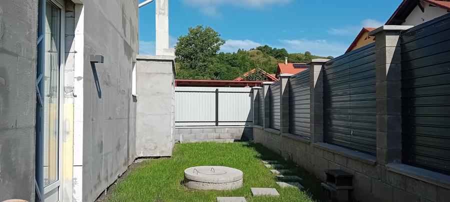 Casă cu 4 camere în Corunca