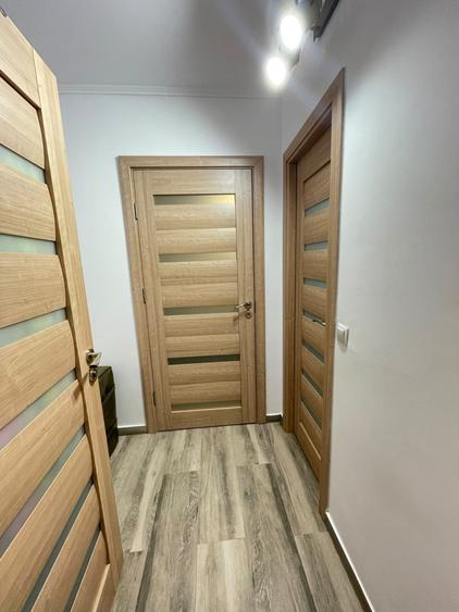 Apartament cu 2 camere semidecomandat, mobilat în Podu Roș