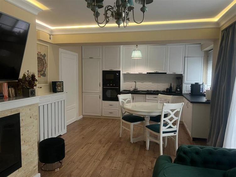 Apartament cu 2 camere decomandat în Bucium — fotografia 3