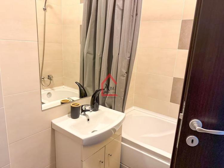 Apartament cu 2 camere semidecomandat, mobilat în Central