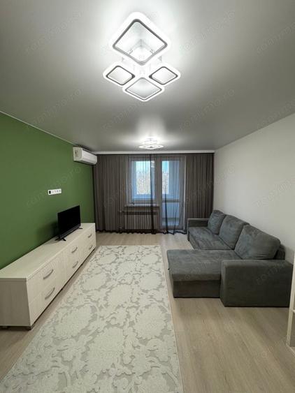 Apartament cu 3 camere decomandat în Florilor