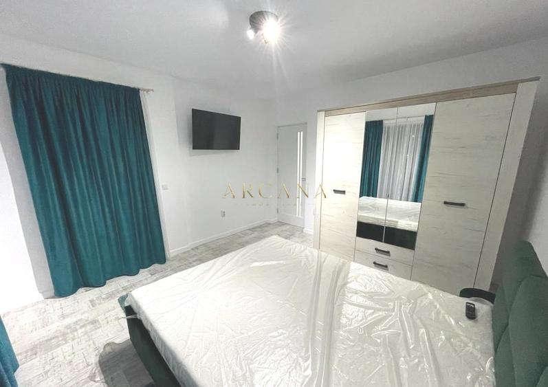 Apartament cu 4 camere semidecomandat, mobilat în Borhanci