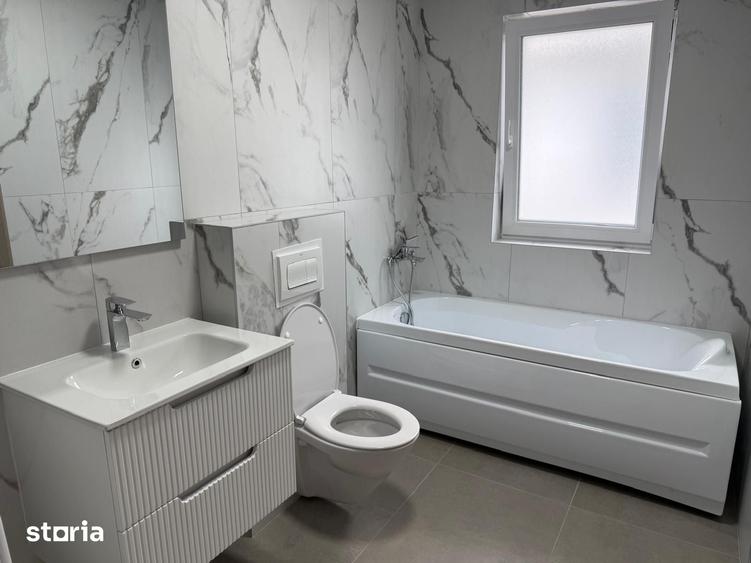 Casă cu 4 camere cu Teren 400 Mp în Central