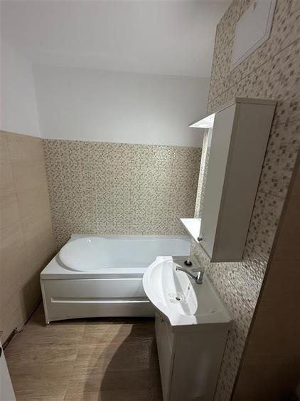 Apartament cu 2 camere decomandat în Podul de Fier