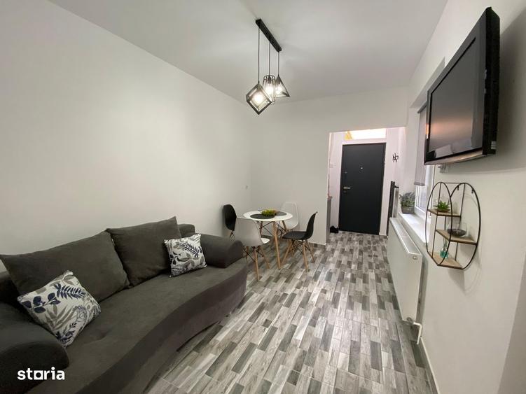Apartament cu 2 camere, mobilat în Central