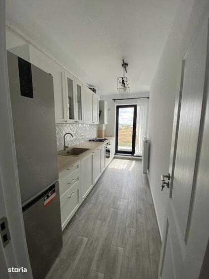 Apartament cu 2 camere decomandat în Roșu — fotografia 3