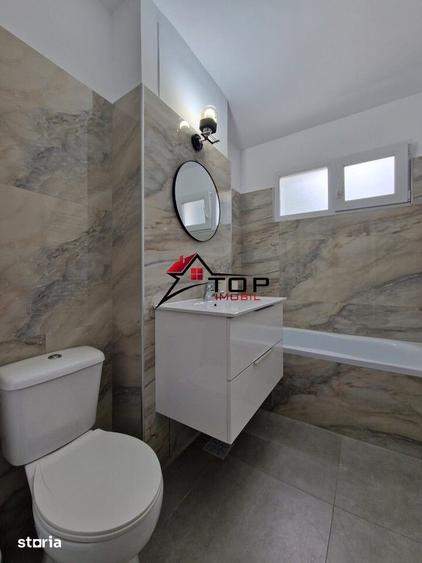 Apartament cu 2 camere semidecomandat, mobilat în Podu Roș
