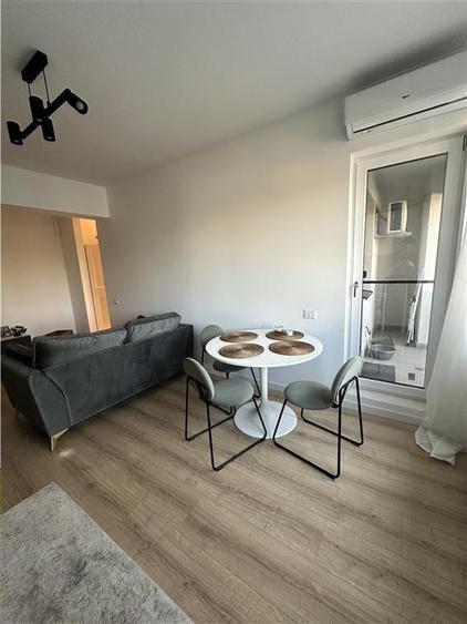 Apartament cu 2 camere semidecomandat, mobilat în Titan