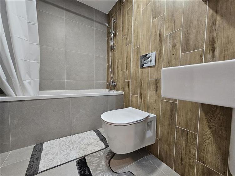 Apartament cu 3 camere decomandat, mobilat în Tractorul
