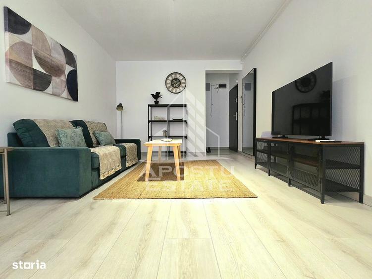 Apartament cu 3 camere, mobilat în Central