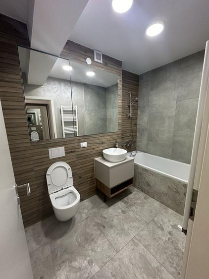 Apartament cu 2 camere decomandat în Tractorul