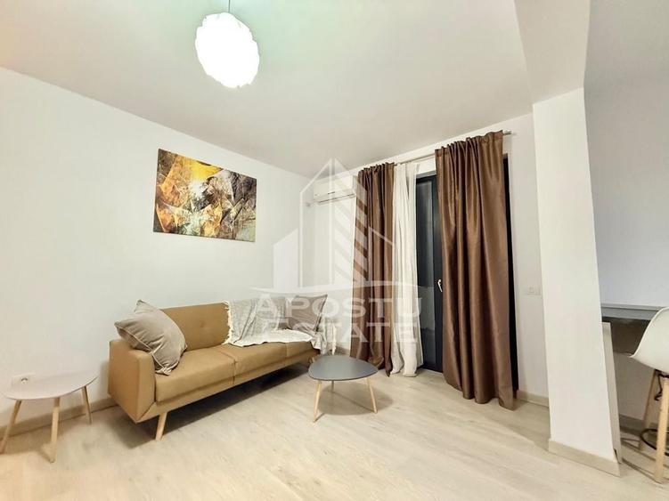 Apartament cu 2 camere semidecomandat, mobilat în Dâmbovița