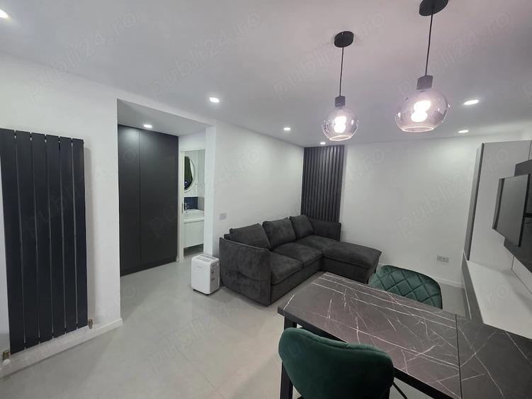 Apartament cu 3 camere semidecomandat în Central