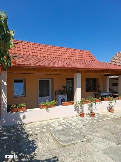 Casă cu 2 camere decomandat cu Teren 1150 Mp în Slimnic