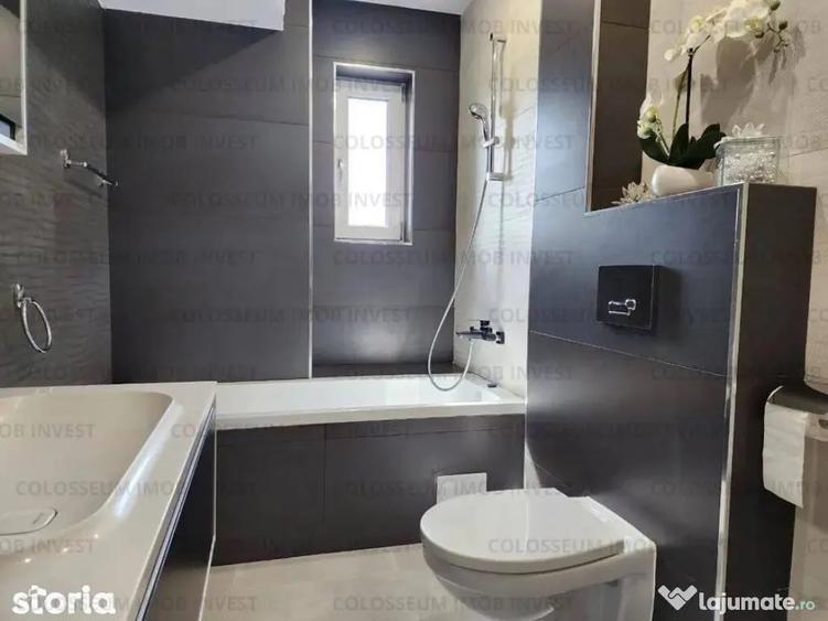 Apartament cu 4 camere decomandat în Tractorul