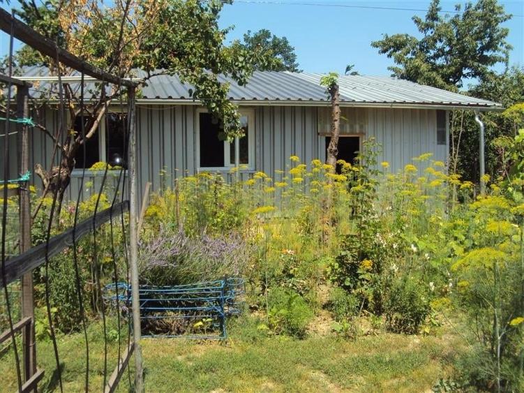 Casă individuală cu 5 camere cu Canalizare în Vest