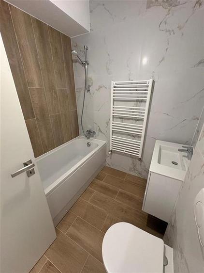 Apartament cu 2 camere decomandat în Tractorul